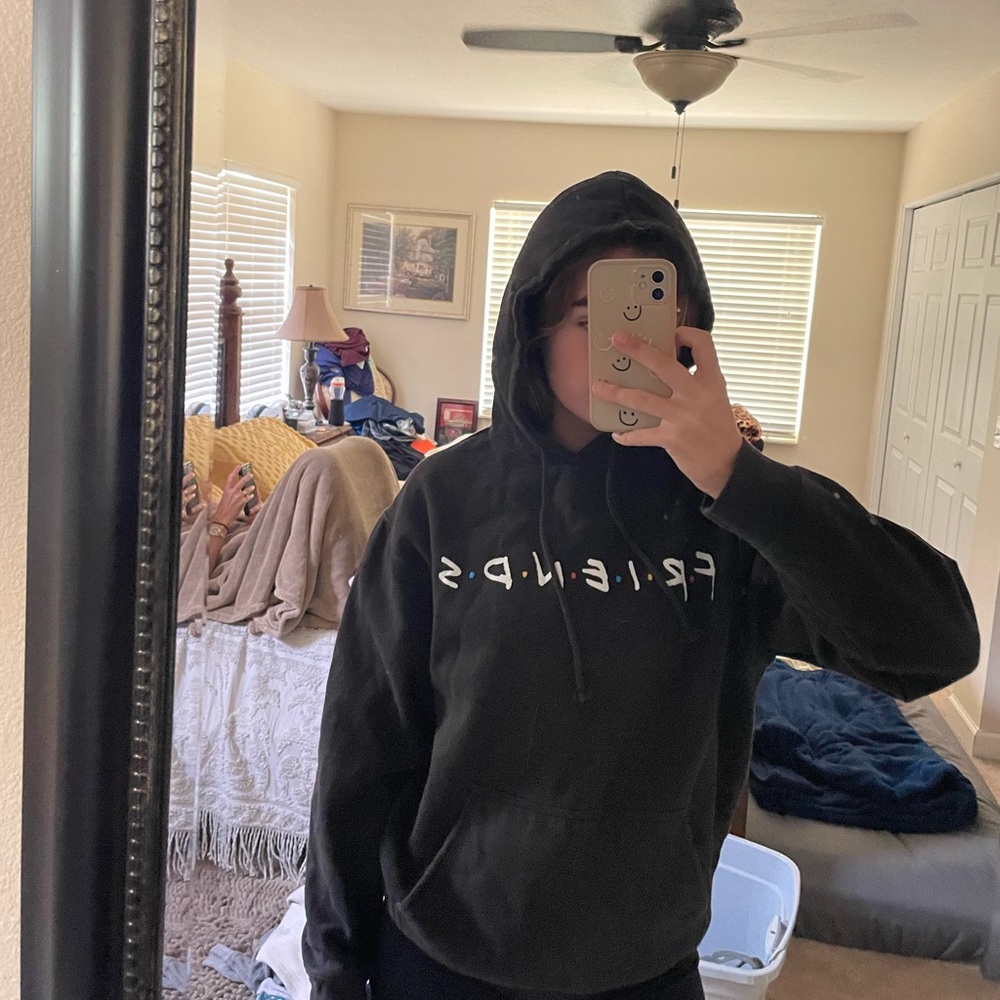 Medium Black Friends Hoodie had some bleach spots on back